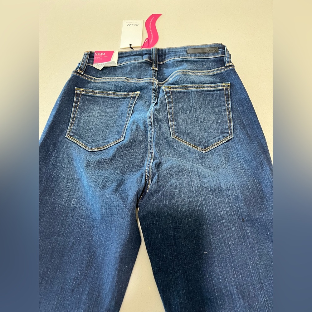 Woman stone wash blue jeans, size 5. Brand new with tags, never worn.